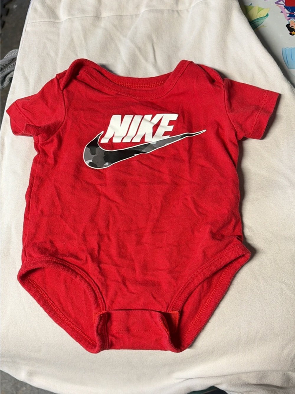 Nike Red Infant One-Piece Bodysuit with White Logo